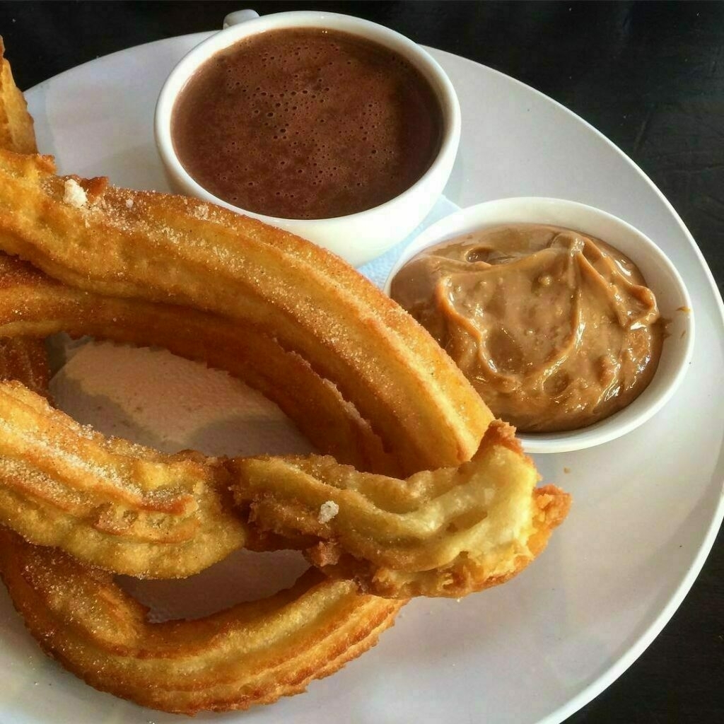 churros with chocolate and caramel sauces at Bocados Spanish Kitchen