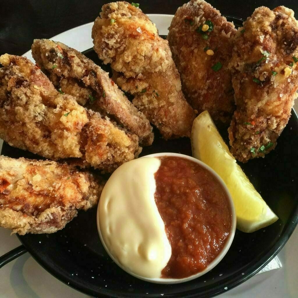 crispy chicken wings at Bocados Spanish Kitchen