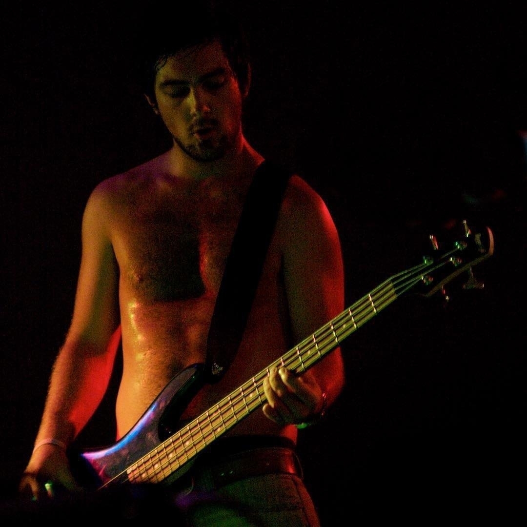 shirtless bass player, ty brennock